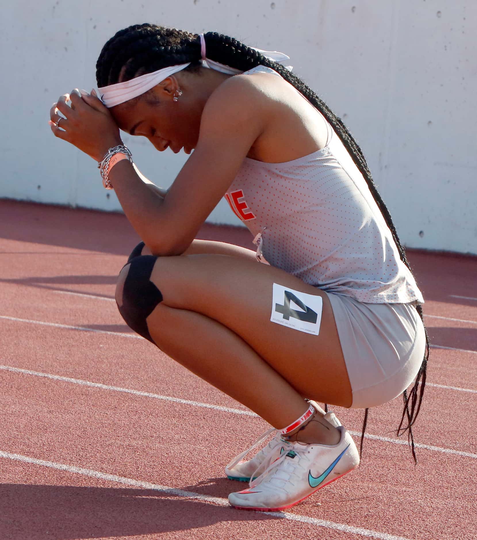 Arlington Bowie's Janet Nkwoparah pauses to soak in the moment after winning the Class 6A...