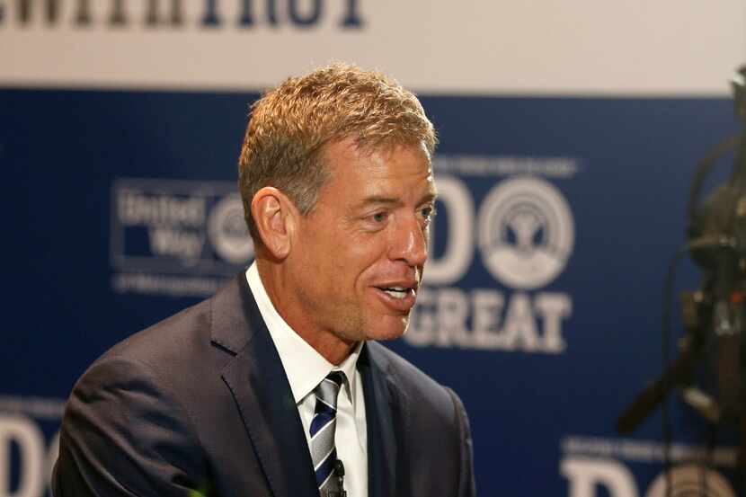 Former Dallas Cowboy quarterback Troy Aikman speaks during a media interview at  United Way...