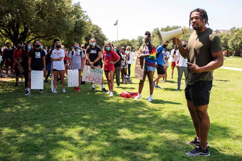 SMU safety Ra-Sun Kazadi speaks during a Black Lives Matter movement march conducted by SMU...