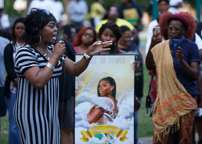 Senior minister Carmarion D. Anderson of Black Transwomen Inc. speaks during a candlelight...