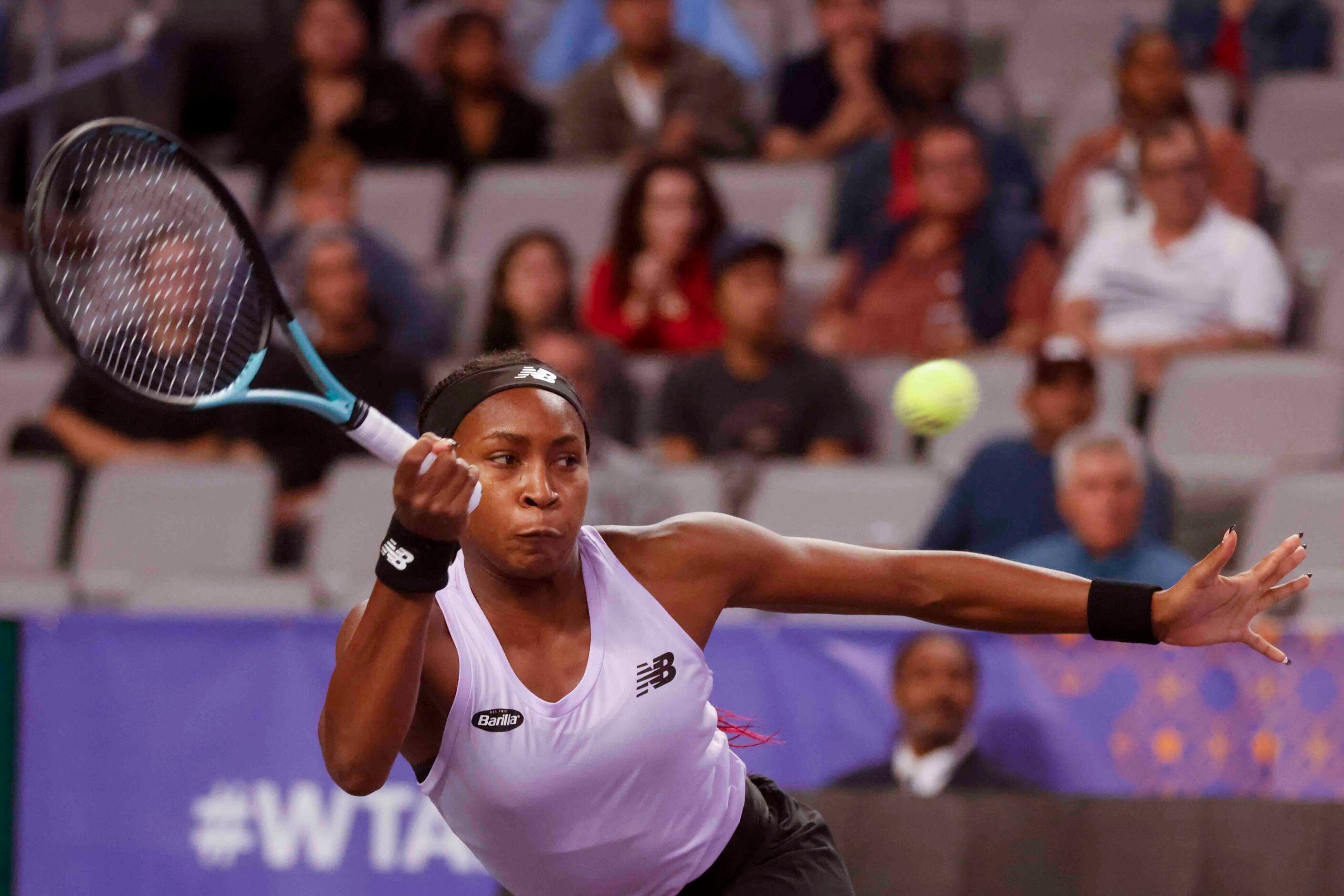 Coco Gauff of the USA returns a shot against Caroline Garcia of France on day two of the WTA...