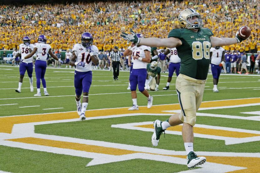Baylor tight end Sam Tecklenburg (88) celebrates in the end zone after catching a...