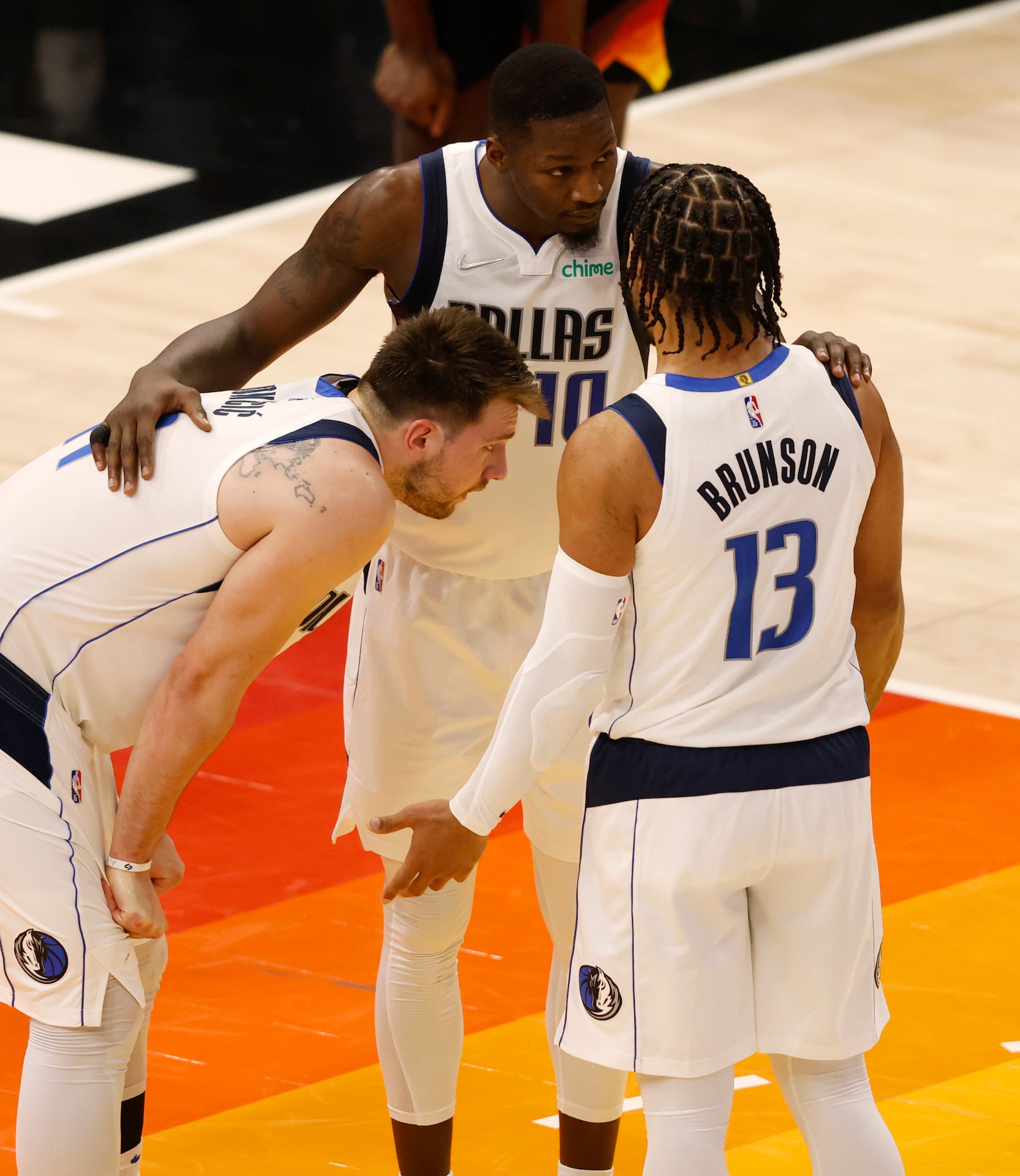 Dallas Mavericks guard Luka Doncic (77), Dallas Mavericks forward Dorian Finney-Smith (10)...