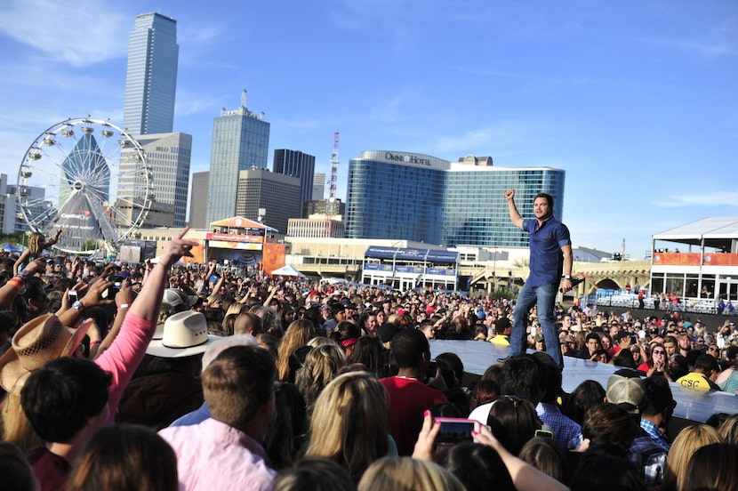 Mike Eli of the Eli Young Band performs onstage at the 2014 NCAA March Madness Music...