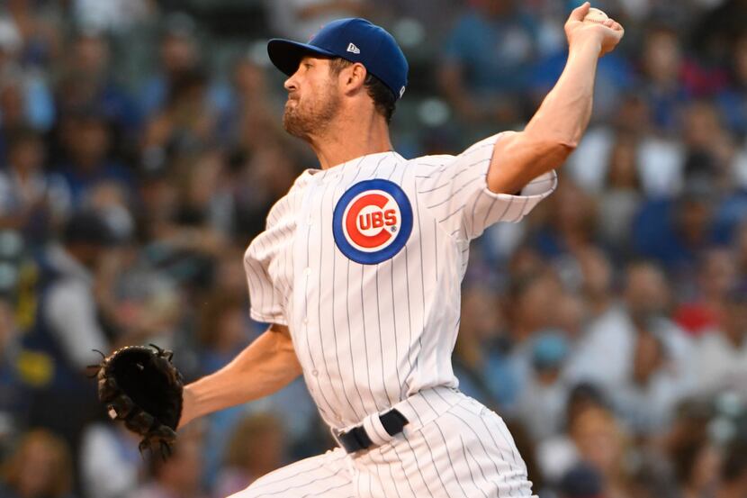 Chicago Cubs starting pitcher Cole Hamels (35) throws to a Cincinnati Reds batter during the...