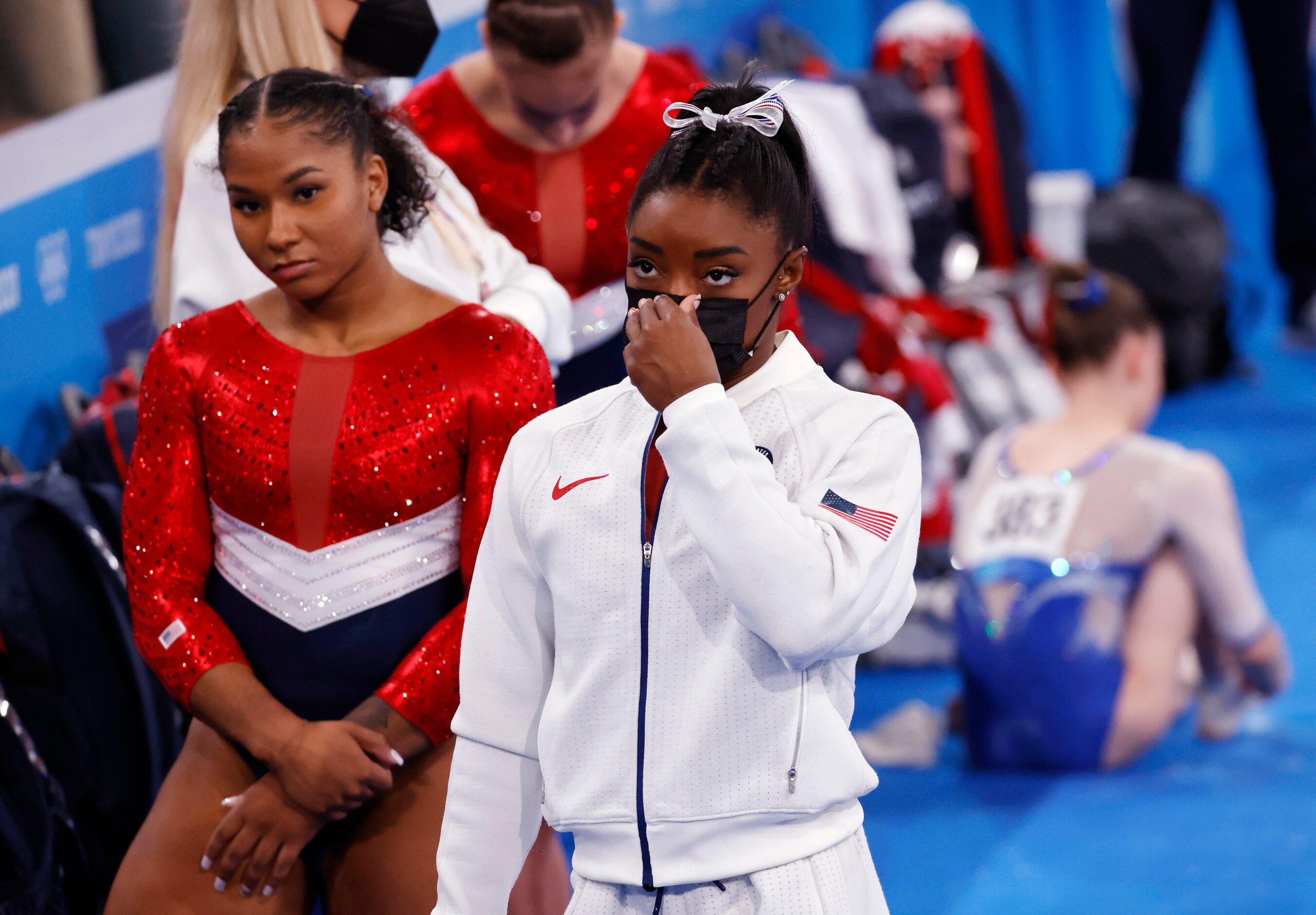 USA’s Simone Biles next to Jordan Chiles as USA prepares to compete on the balance beam...