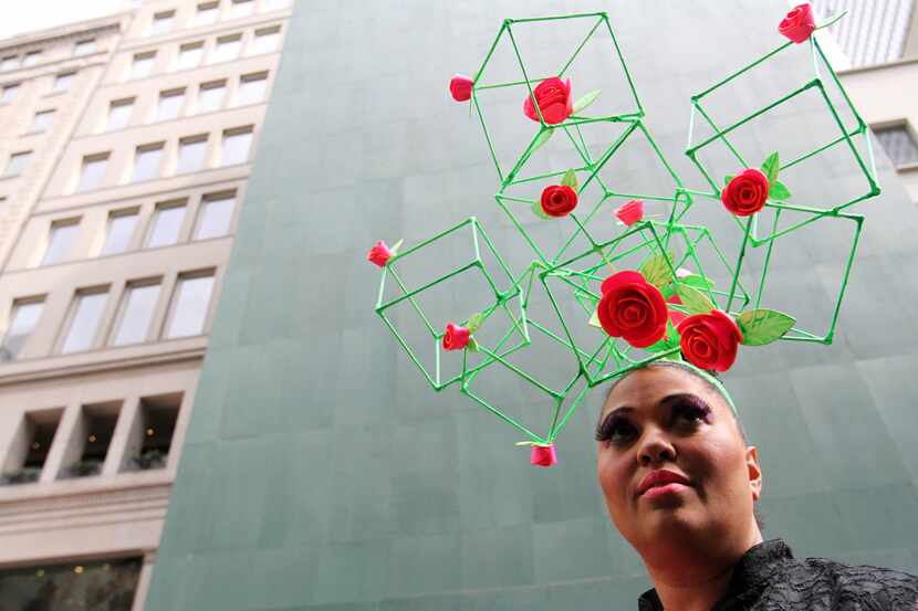 Pata Luna Llano poses for photographs as she takes part in the Easter Parade along New...