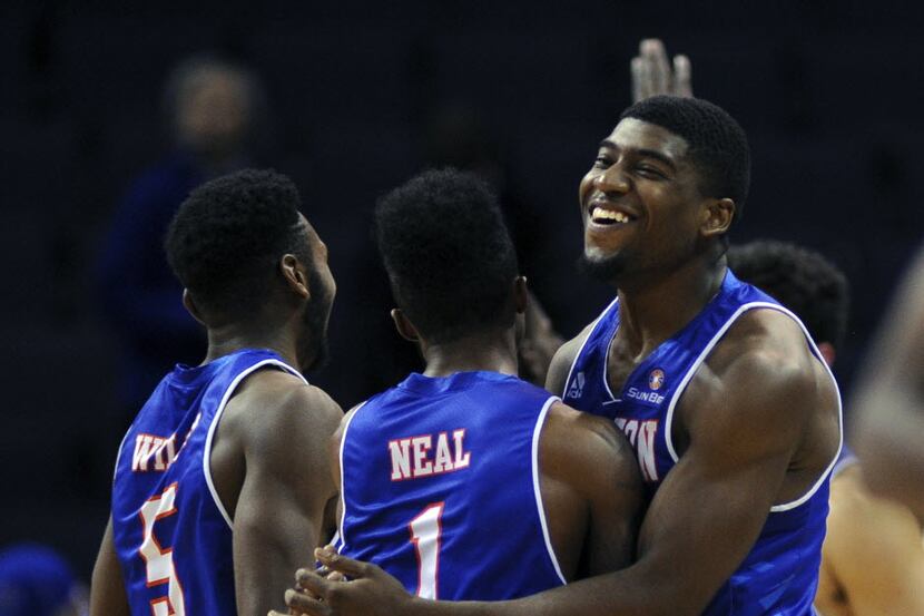 Nov 23, 2015; Memphis, TN, USA; Texas-Arlington Mavericks guard Jalen Jones (10) and...