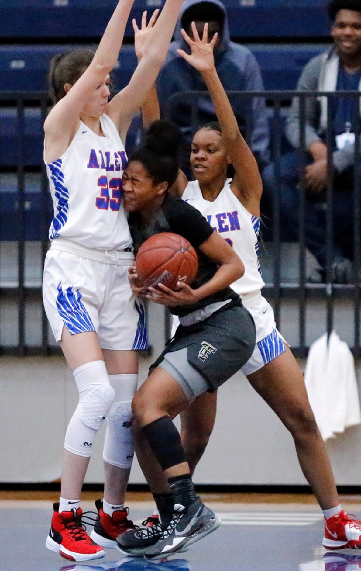 The Colony High Schoolâs Jewel Spear (23) runs into Allen High Schoolâs Mackenzie Wurm...