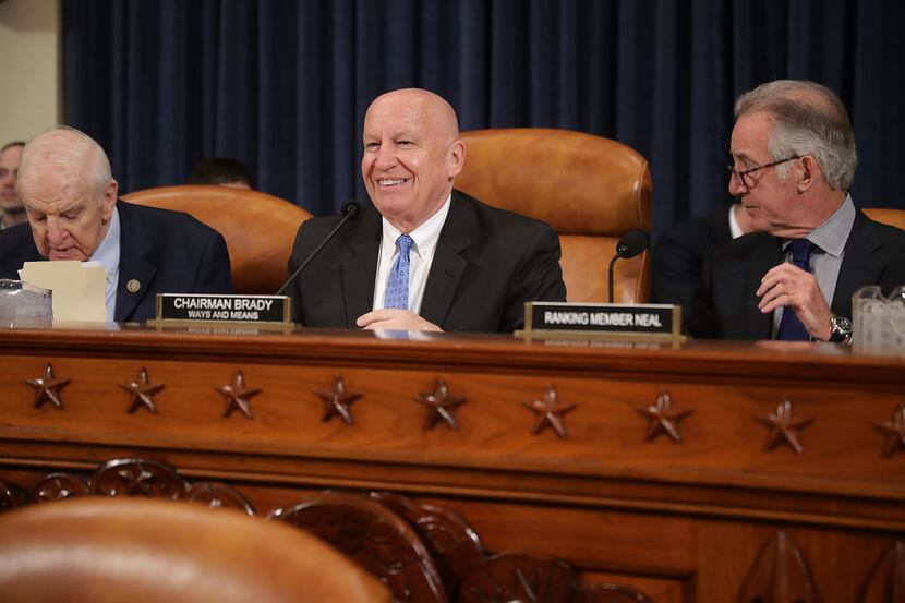House Ways and Means Committee Chairman Kevin Brady (center) and ranking member Richard Neal...