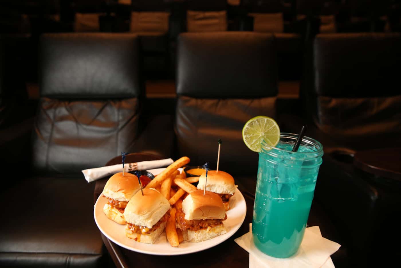 The crispy chipotle sliders and the blue thing margarita are on the menu at Movie Tavern in...
