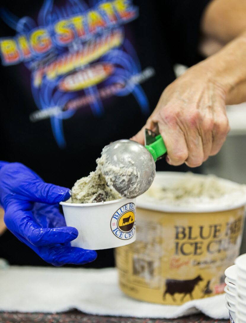 Sylvia Schmidt scoops Blue Bell Ice Cream to serve to customers at Big State Fountain Grill...