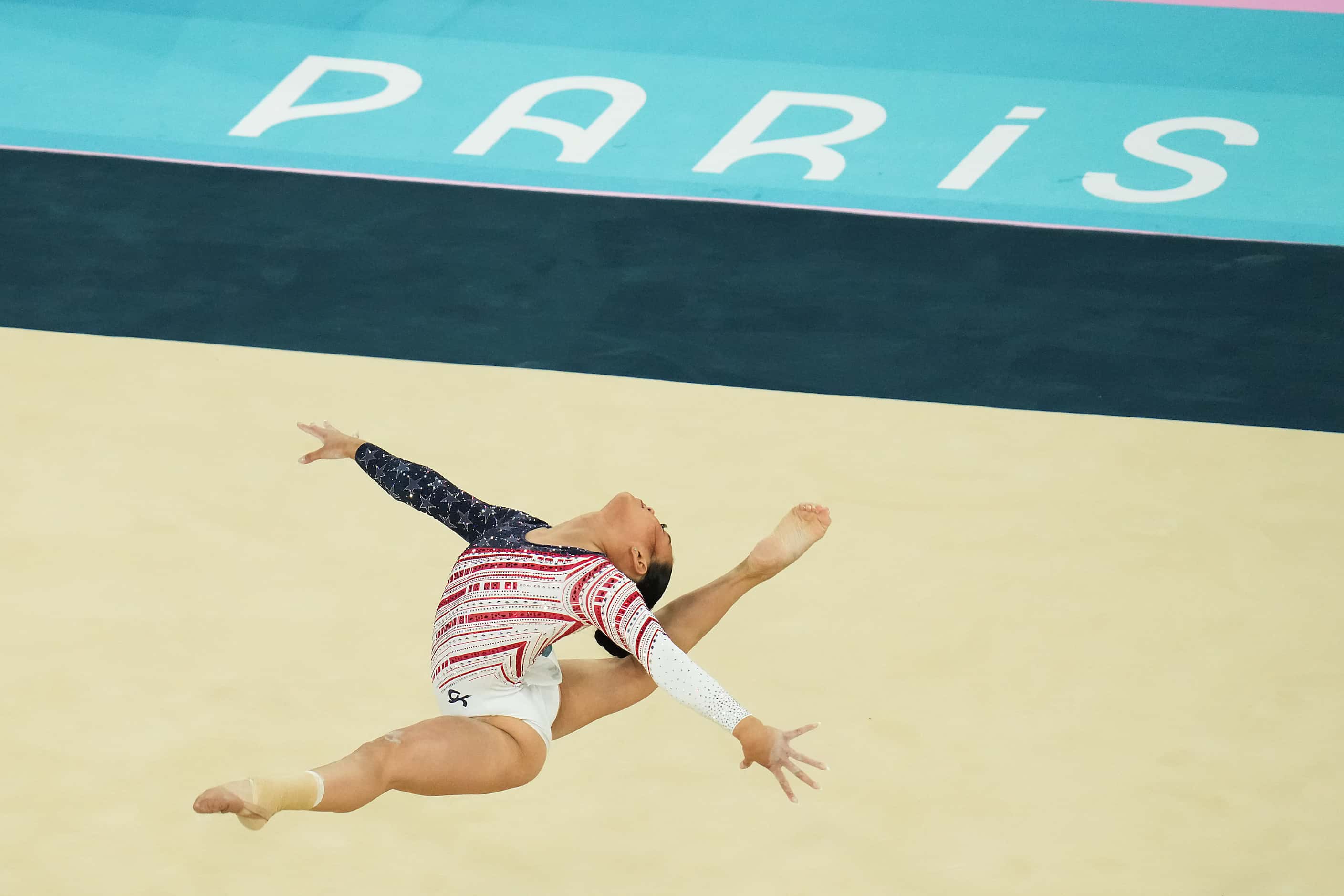 Suni Lee of the United States competes on the floor during the women’s gymnastics team final...