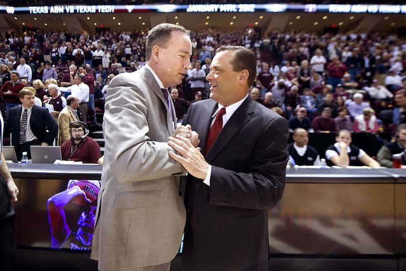 Texas A&M  coach Billy Kennedy, left, greeted former Aggie coach and then-Texas Tech coach...