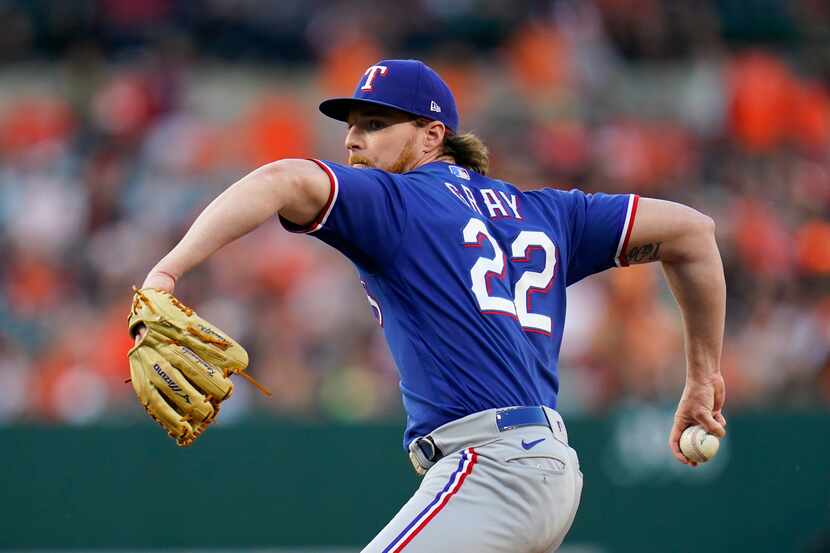 Texas Rangers starting pitcher Jon Gray throws a pitch to the Baltimore Orioles during the...