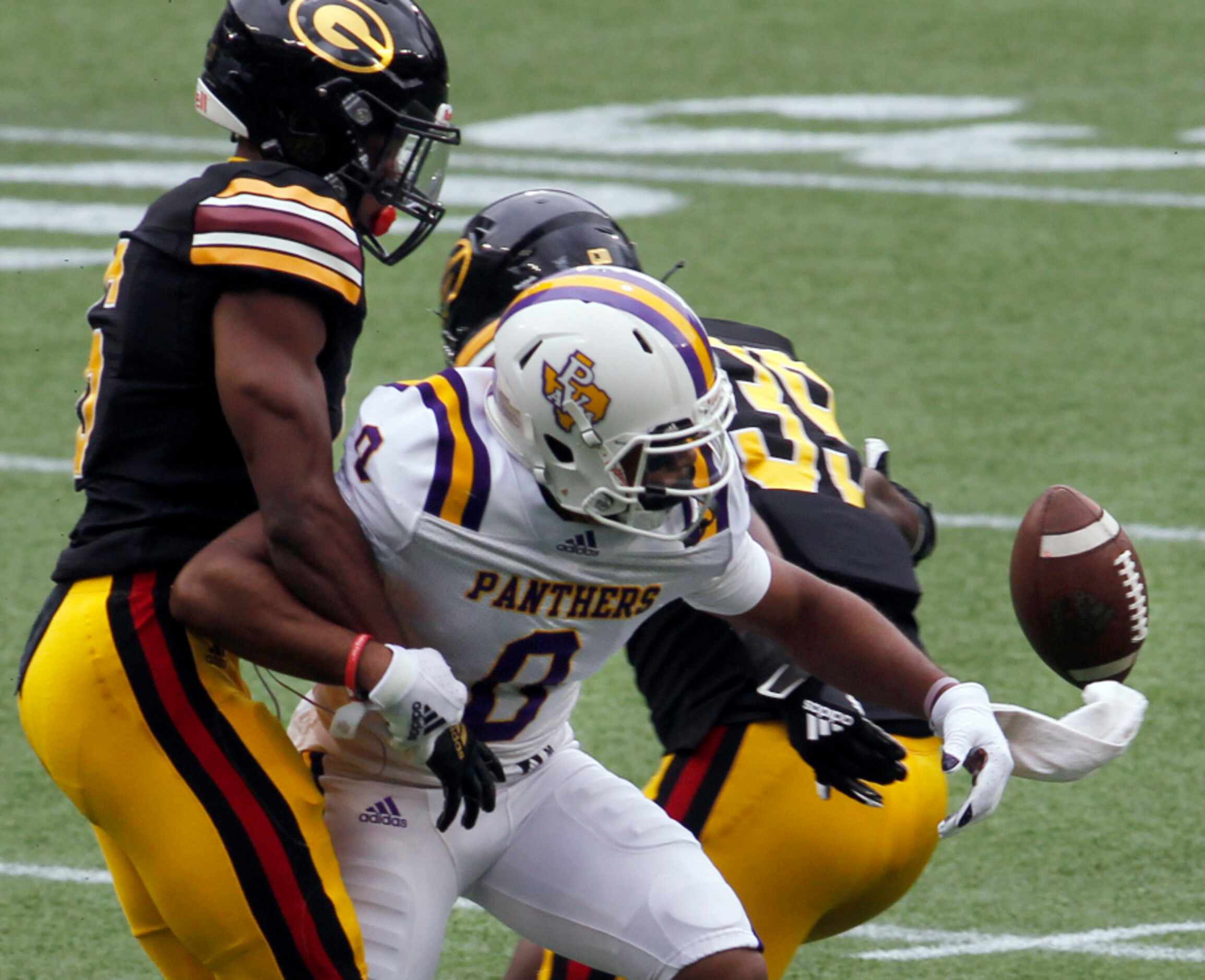 Prairie View A&M receiver Tony Mullins (0) has the ball jarred loose during the process of...