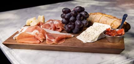 The prosciutto and délice board, $43, is a splurge. But it's a fun, shareable item to get...