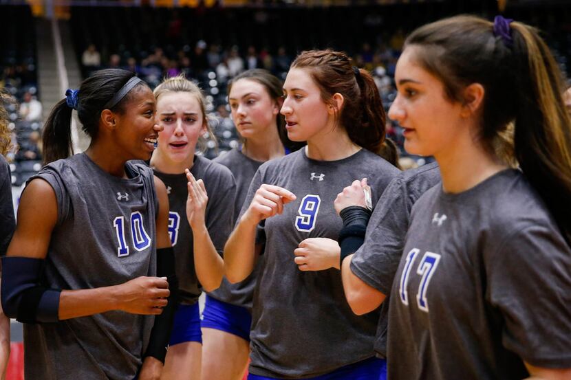 The Trophy Club Byron Nelson Bobcats celebrate after winning a class 6A volleyball state...