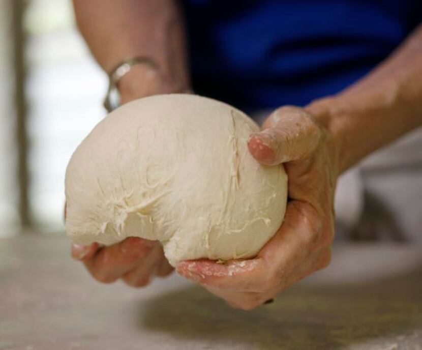 
Instead of kneading, simply form the dough into a ball with a smooth surface, tucking the...