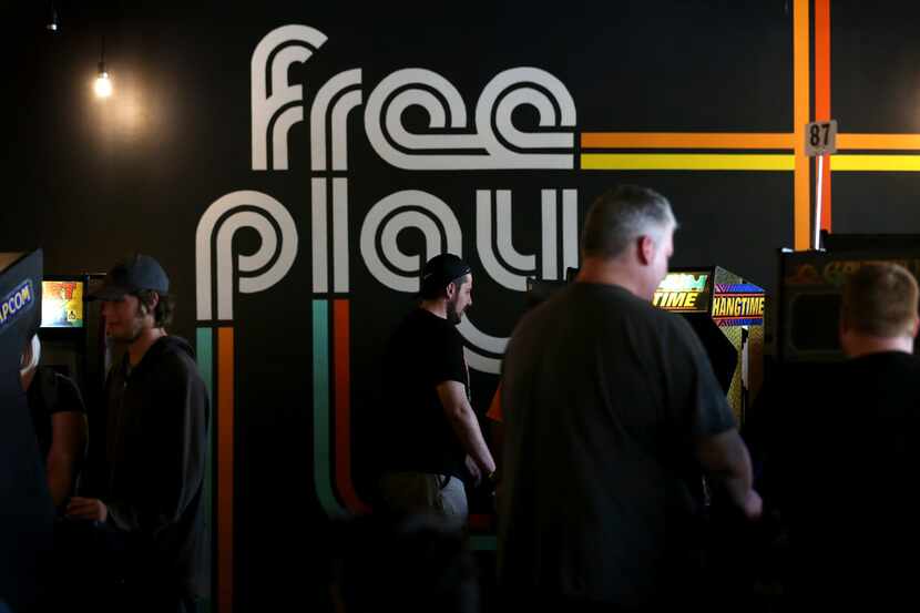 People play video games at Free Play in Richardson, Texas on Saturday, Aug. 11, 2018. 