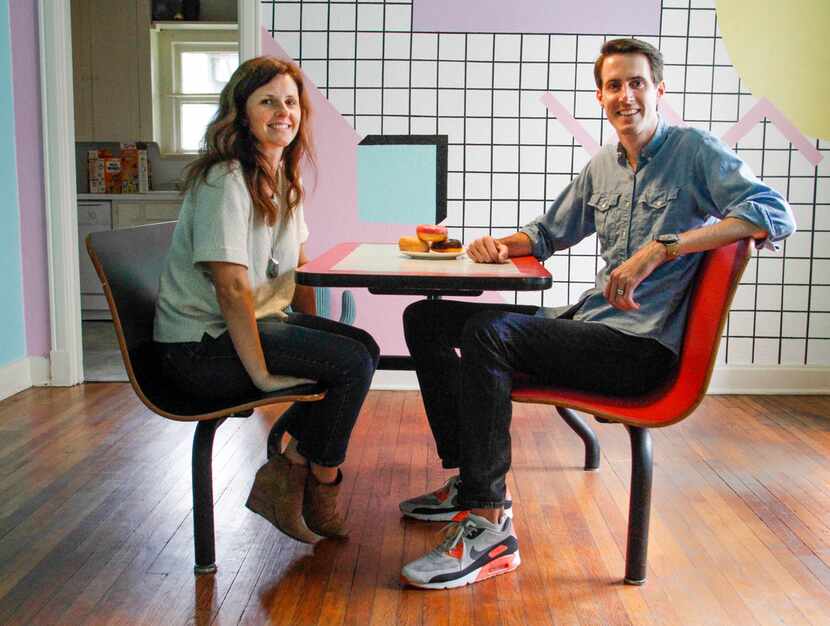 Owners Jeremy and Kelsey Turner sit at the dining table in The McFly.   