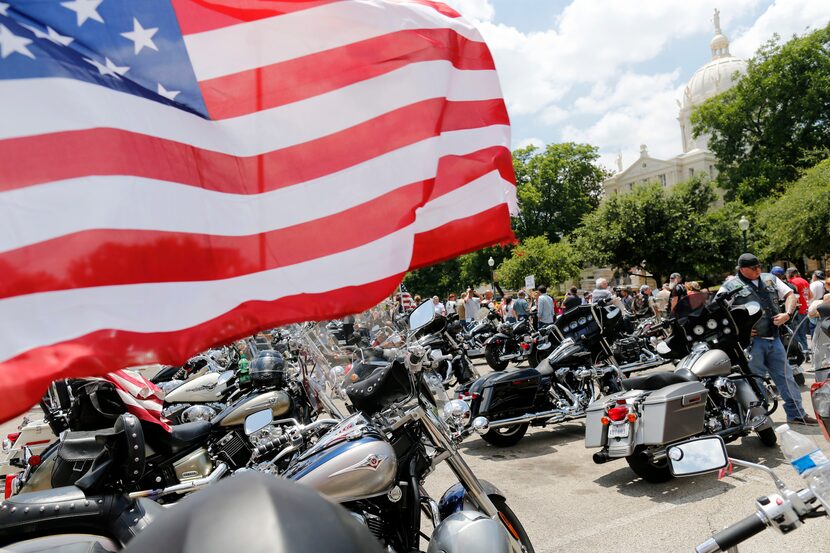 Bikes lined up in the parking lot during a motorcycle rally near McLennan County Courthouse...