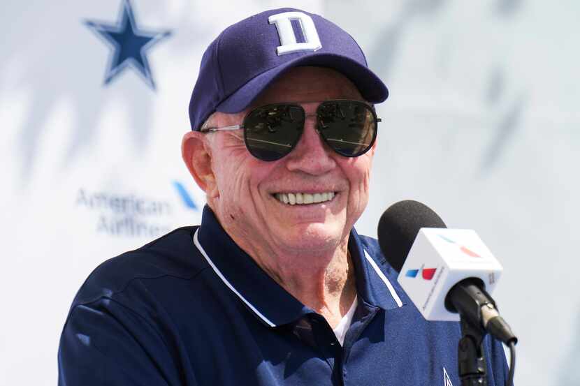 Dallas Cowboys owner and general manager Jerry Jones addresses reporters during pre-training...