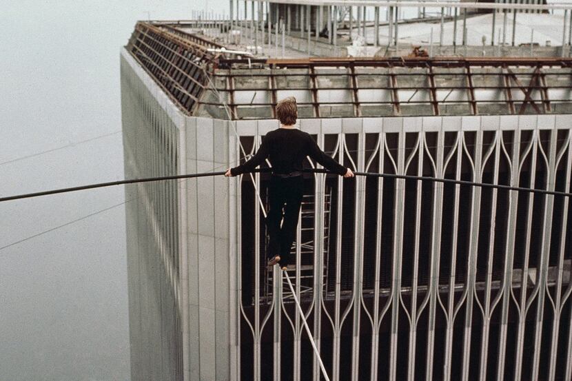 French high-wire artist Philippe Petit walked a tightrope between the twin towers of the...