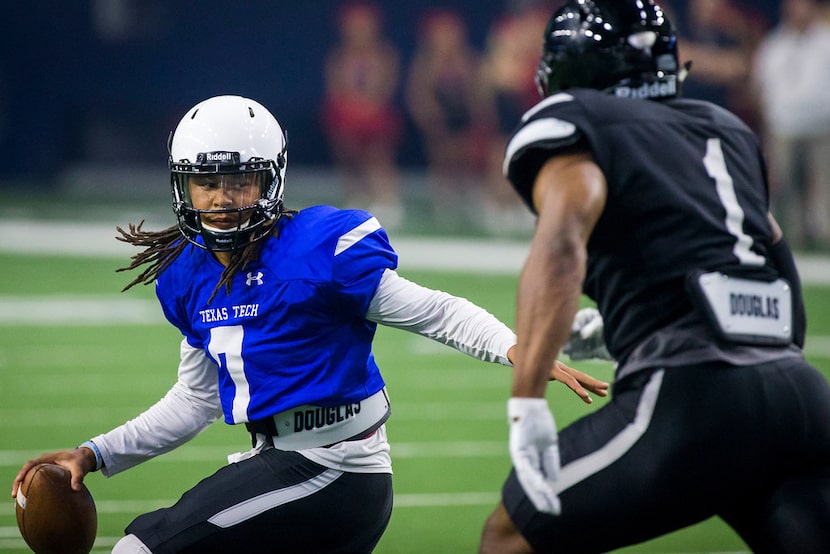 Texas Tech quarterback Jett Duffey (7) scrambles away from linebacker Jordyn Brooks (1)...