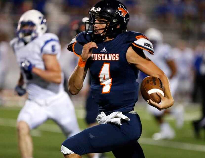 
Sachse High School quarterback Brett Cox (4) gets a long run called back by a penalty in...