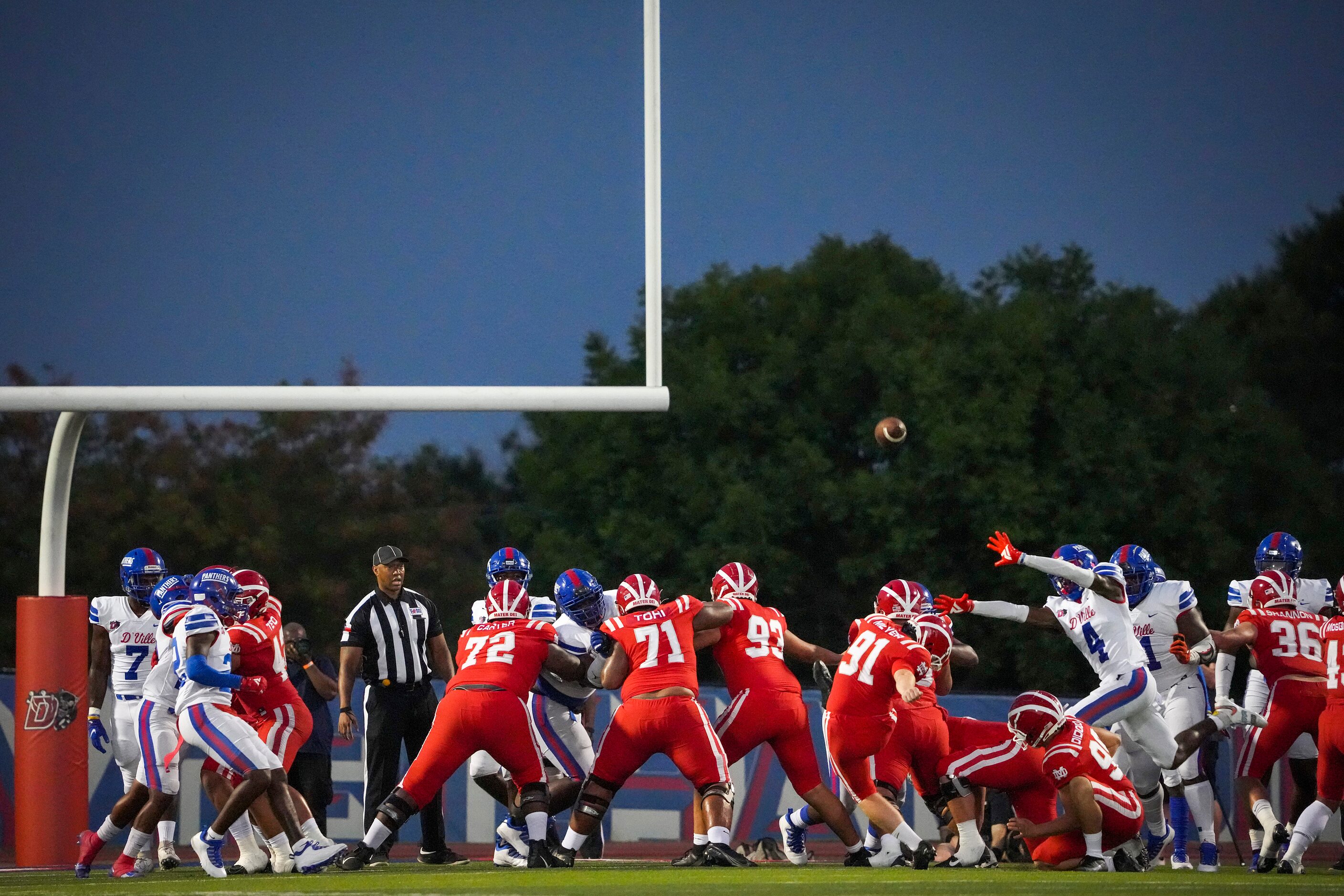 Mater Dei kicker Chase Meyer (91) kicks a field goal past Duncanville defensive back...