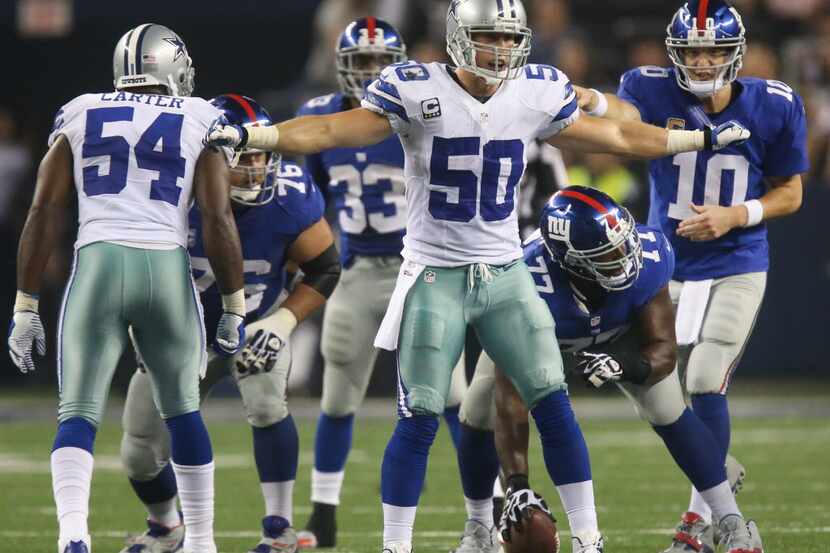 Dallas Cowboys inside linebacker Sean Lee (50) calls defensive signals as New York Giants...