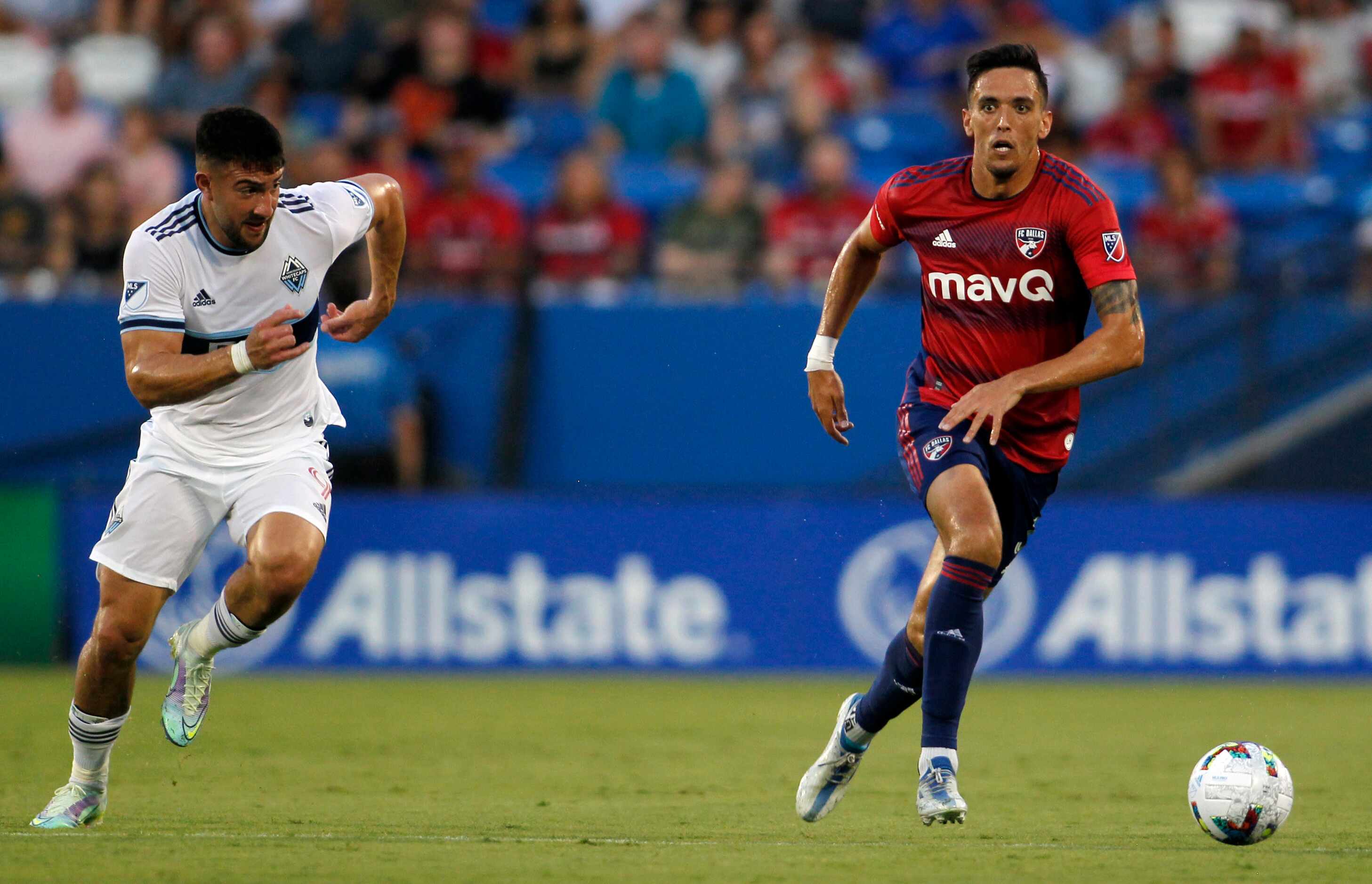 FC Dallas' Jose' Martinez (3), right, controls the ball as he is pursued defensively by...