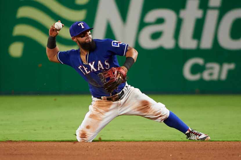 Texas Rangers' Rougned Odor throws out Baltimore Orioles' Danny Valencia during the seventh...
