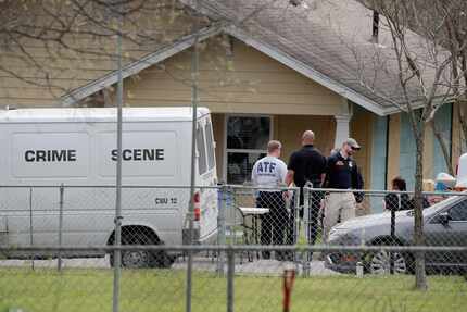 Law enforcement officials continue their investigation at the home of Mark Anthony Conditt...