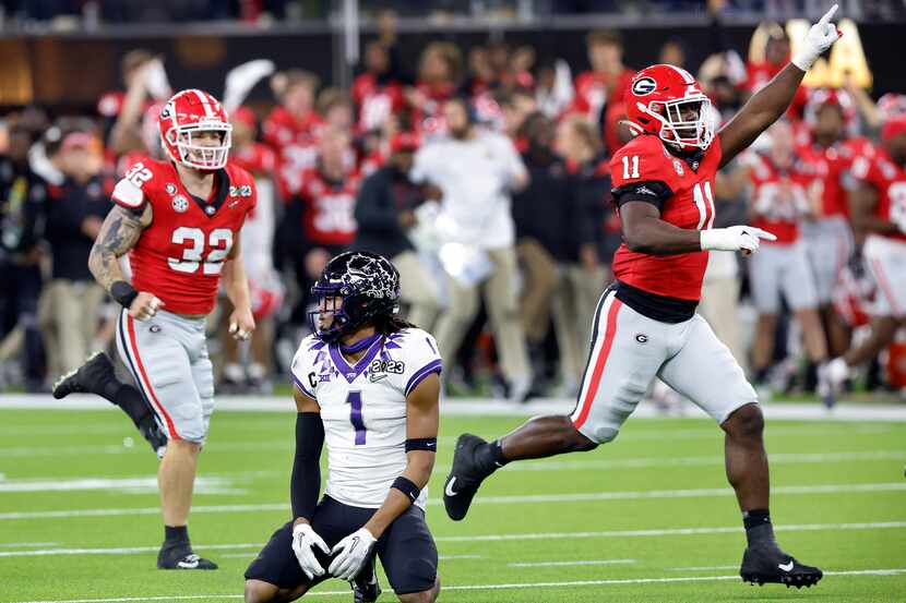 TCU Horned Frogs wide receiver Quentin Johnston (1) is slow to get up as Georgia Bulldogs...