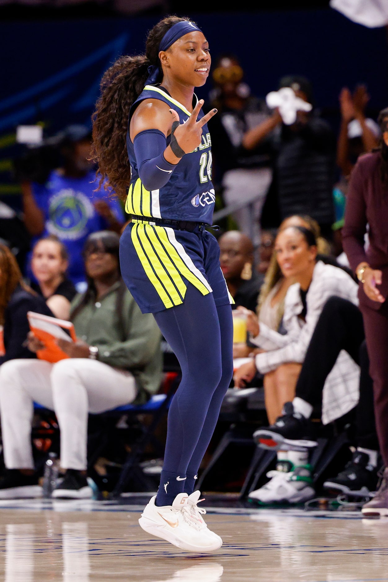 Dallas Wings guard Arike Ogunbowale (24) celebrates after a 3-point shot during the first...