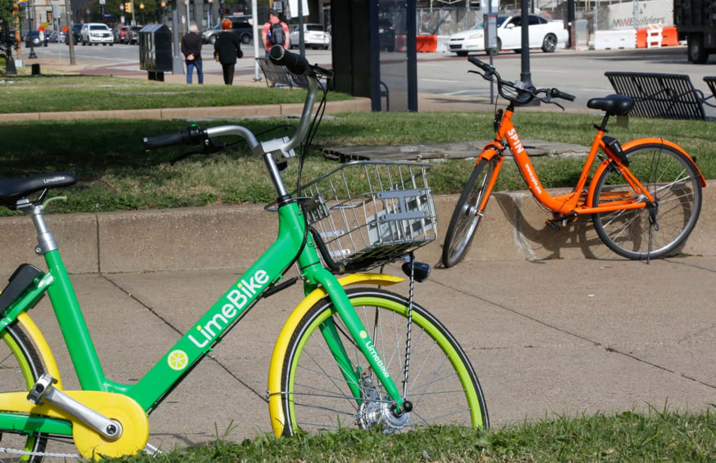 A LimeBike and Spin bike are left in front of Union Station in downtown Dallas.