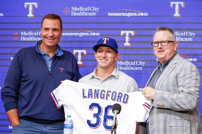 Texas Rangers Executive Vice President Chris Young, (left), and Texas Rangers Senior...