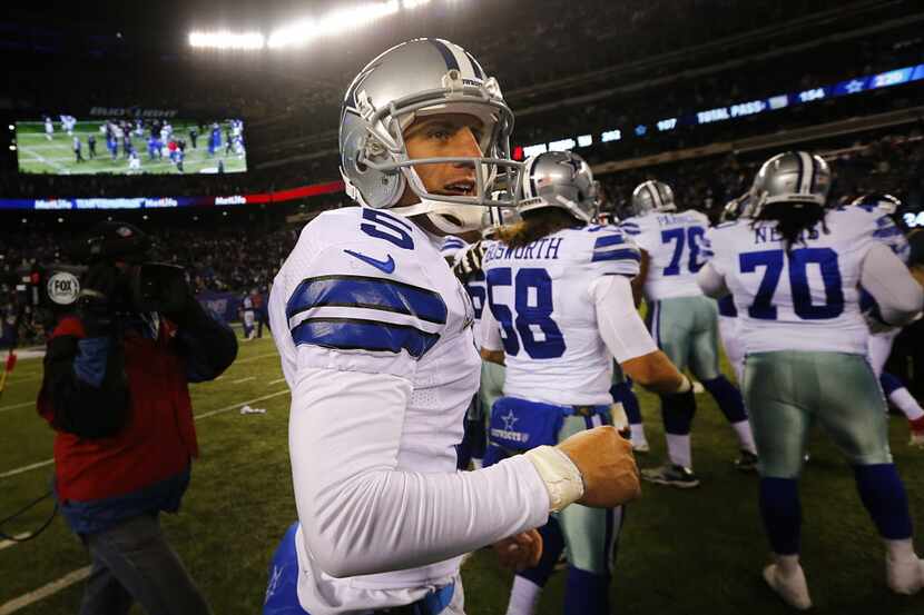 Dallas Cowboys kicker Dan Bailey (5) is all smiles after winning the game against the New...
