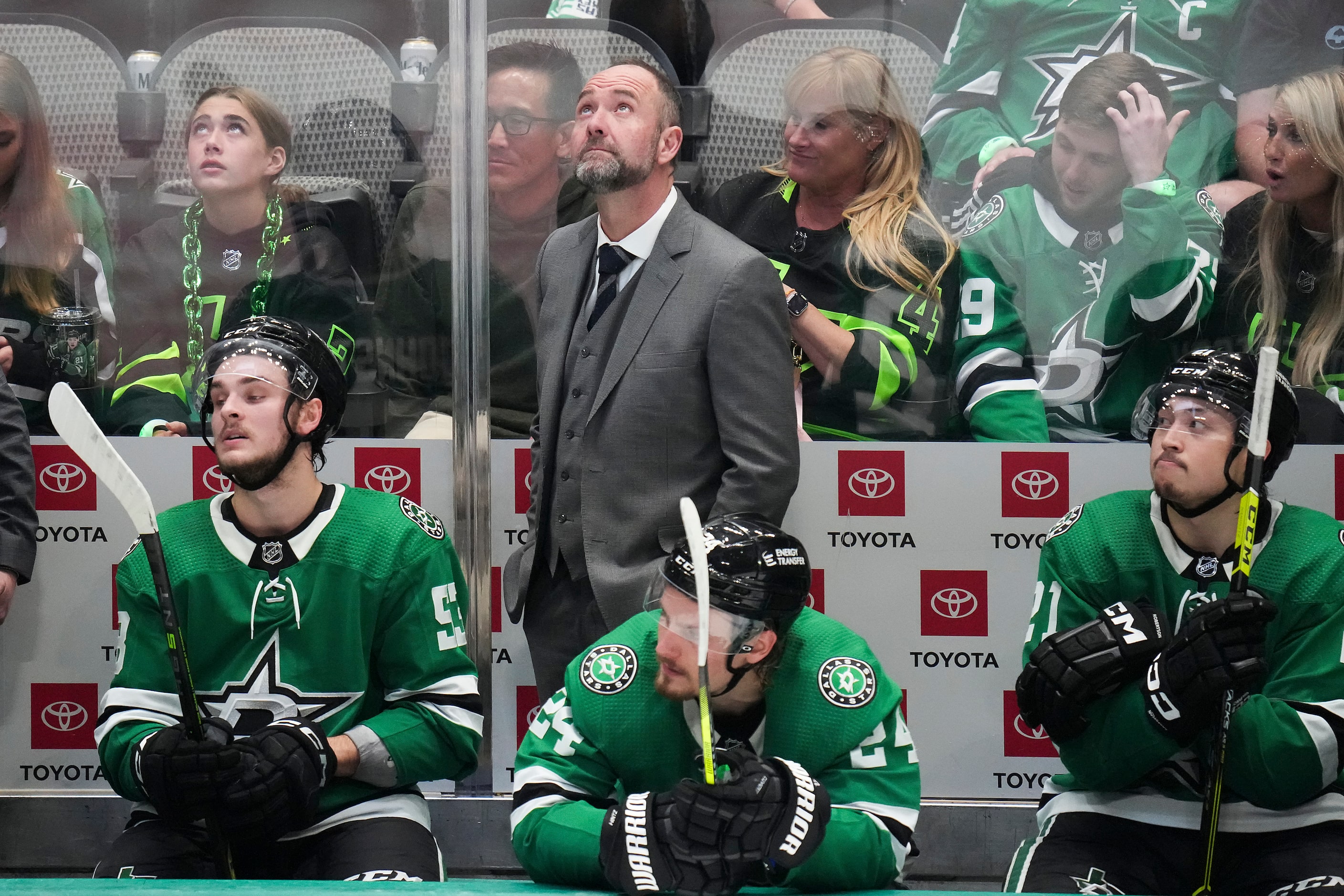 Dallas Stars head coach Pete DeBoer looks on from the bench during the third period in Game...