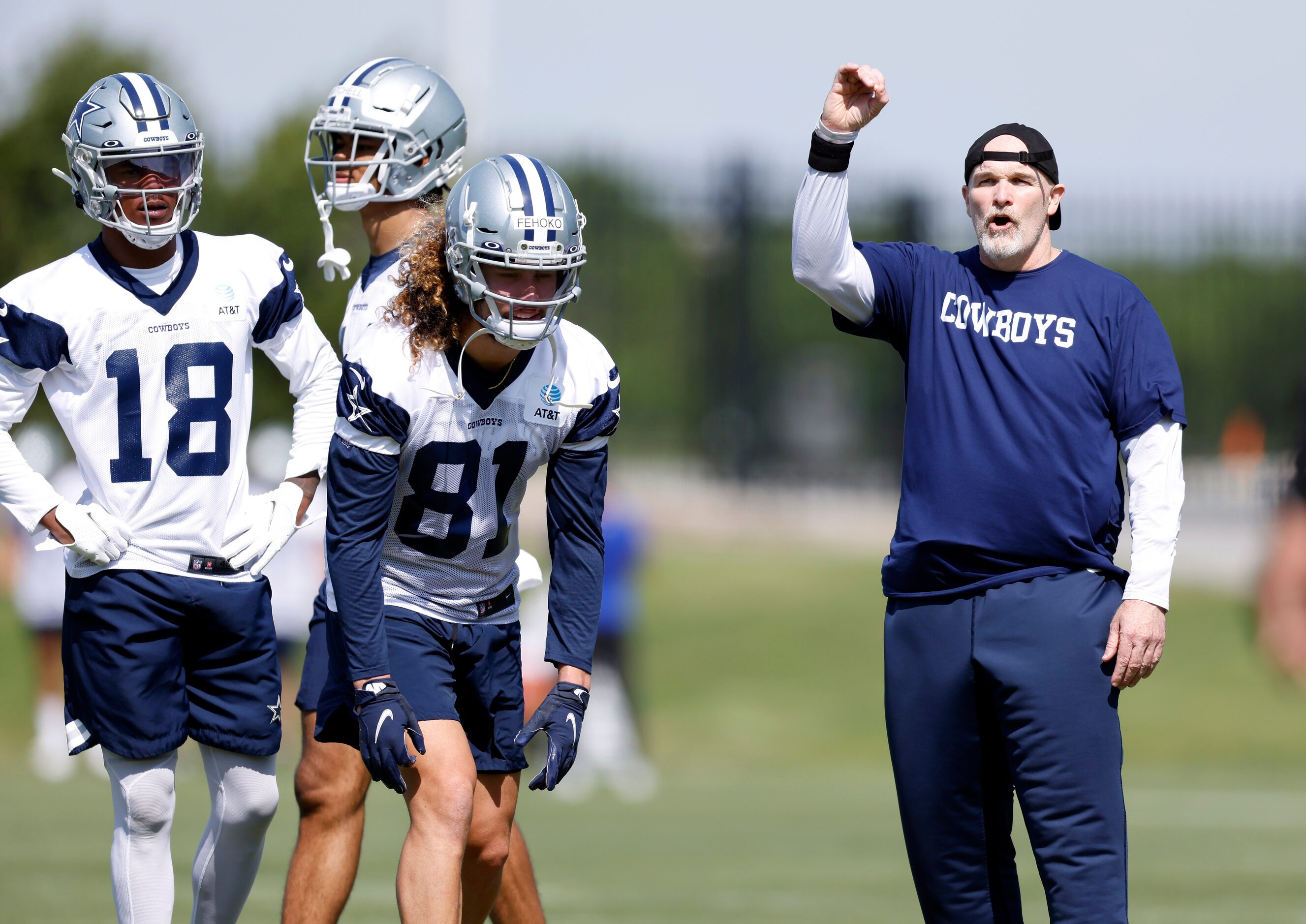 Dallas Cowboys defensive coordinator Dan Quinn yells instruction to his players during...