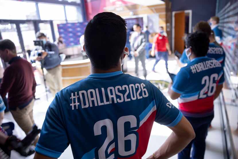 Workers wear #Dallas2026 shirts while leading FIFA delegates on a tour on Saturday, Oct. 23,...