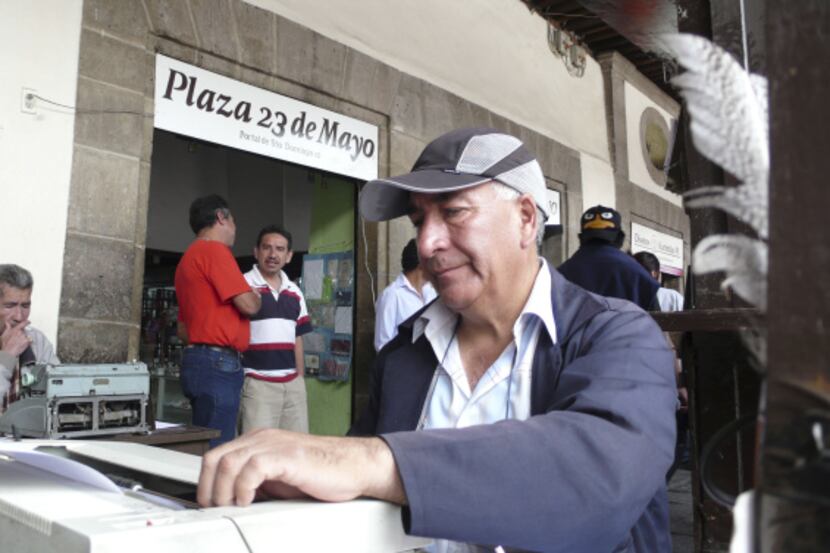  Letter writer Miguel Hernandez, 61, works in what is known as writers' square in Plaza...