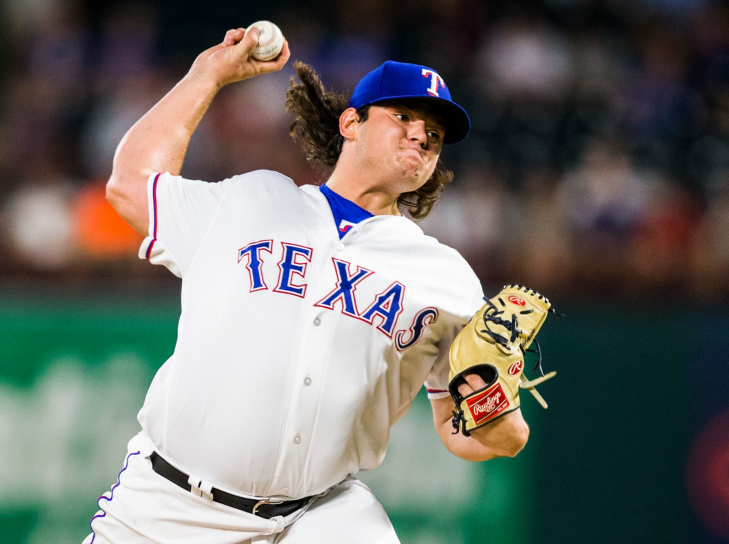 Texas Rangers relief pitcher Ian Gibaut (63) pitches during the ninth inning of an MLB game...