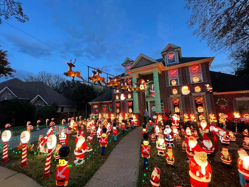 The Grapevine Santa House, which belongs to Louie Murillo, is covered in hundreds of...