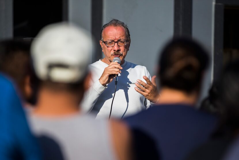 Attorney Carlos Quintanilla speaks to residents at tornado-damaged Southwind Apartments on...