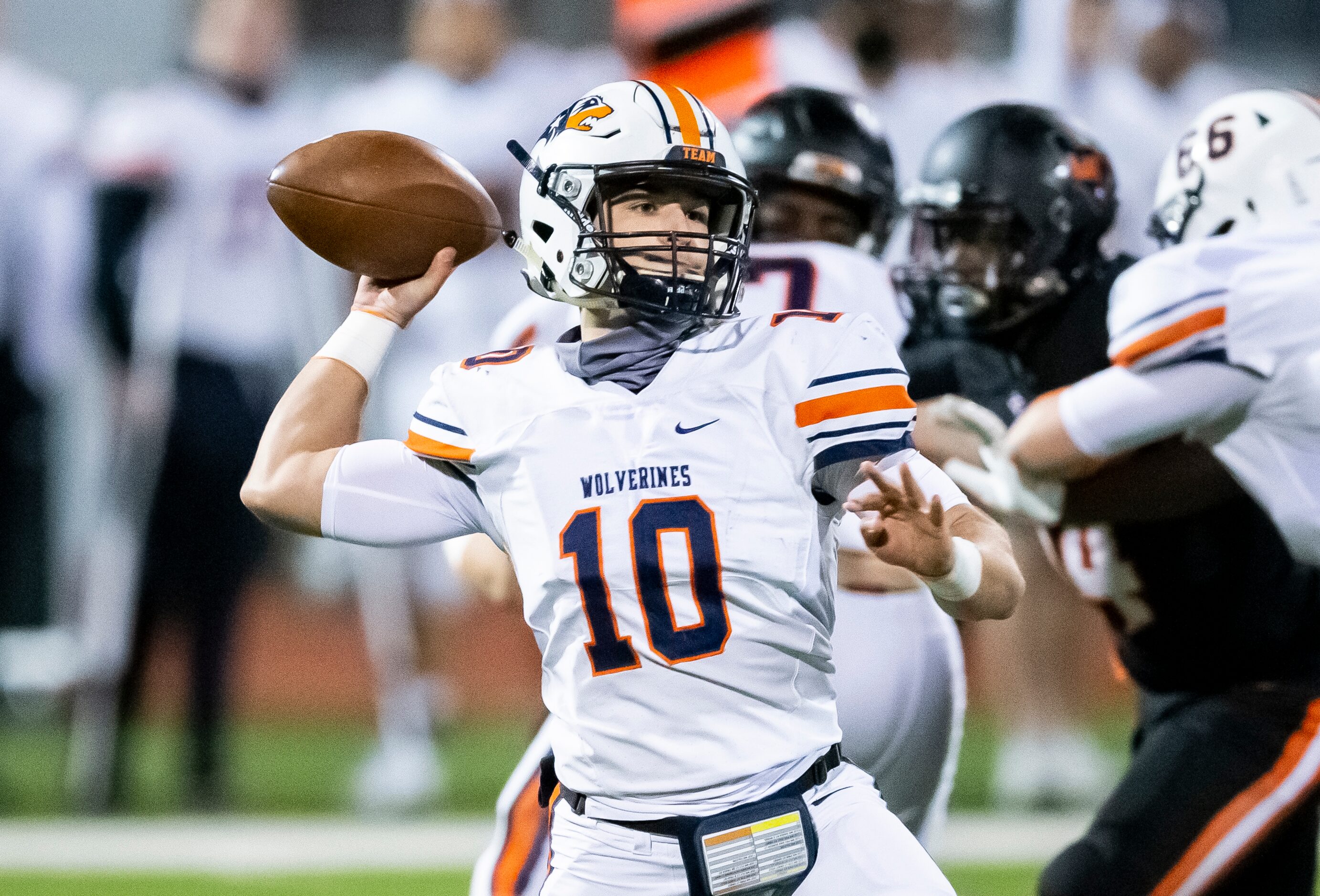 Wakeland senior quarterback Peyton Lewis (10) throws during the first half of a class 5A...