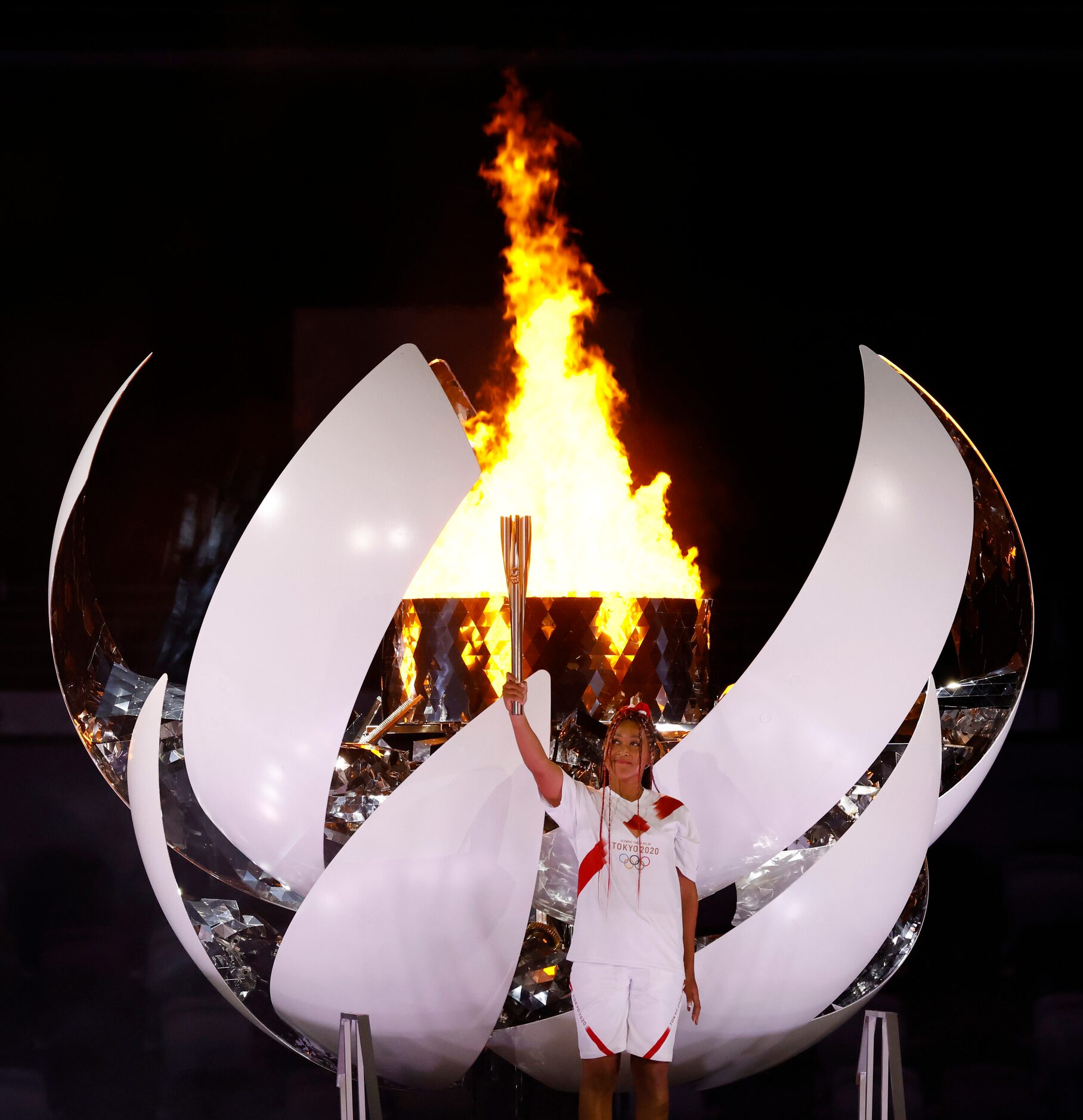 Naomi Osaka after lighting the Olympic cauldron during the opening ceremony for the...