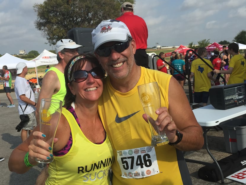 Jona and Jim Berta after placing in their age groups at Jona Berta's first 10K race in Fort...
